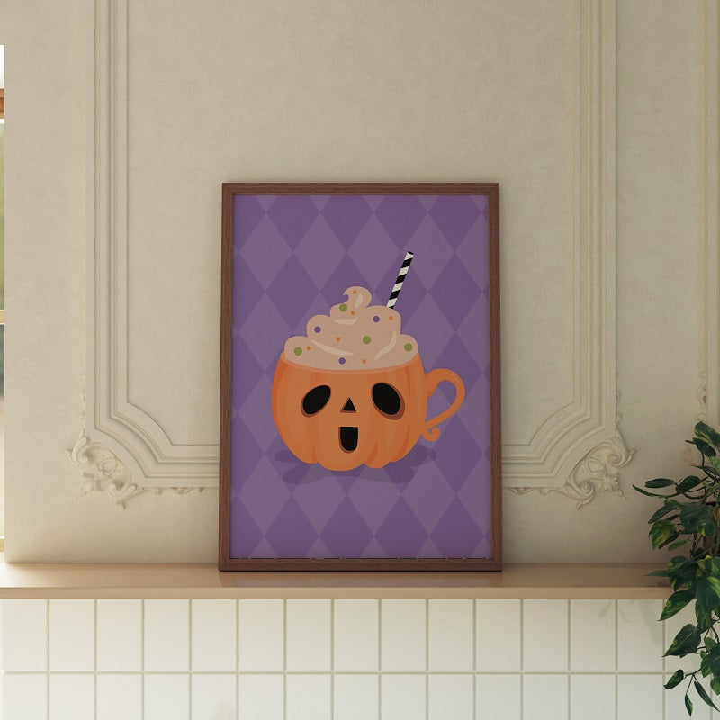 Framed artwork of a pumpkin-shaped cup with whipped cream on a purple diamond patterned background.