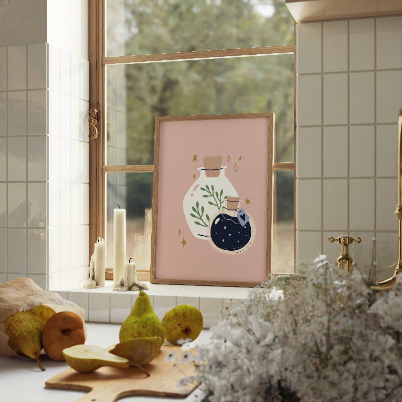 Decorative wall art with a pink frame in a bathroom setting.