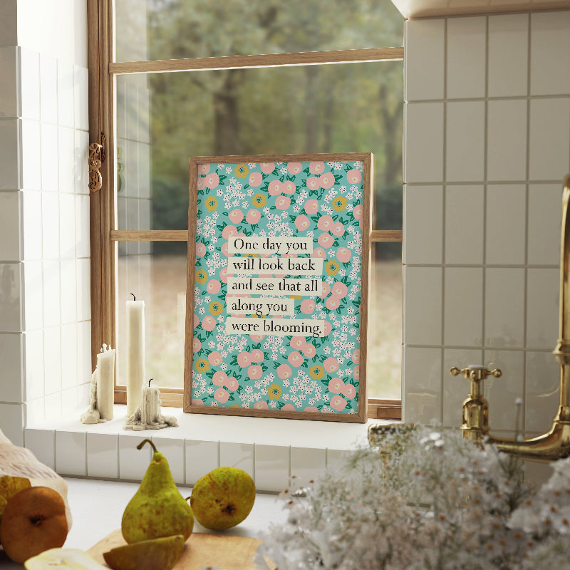 Decorative floral print with inspirational quote in a bathroom setting