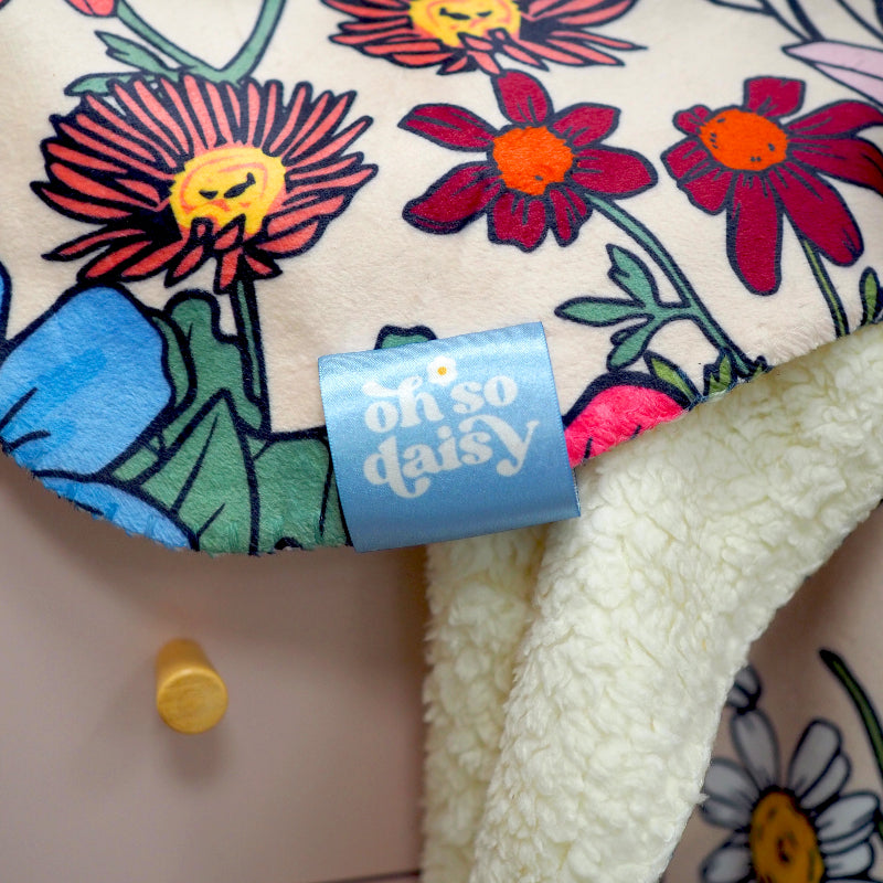 She's A Wildflower by Oh So Daisy in collaboration with Lust Home Sherpa Fleece matching blanket to wallpaper. 