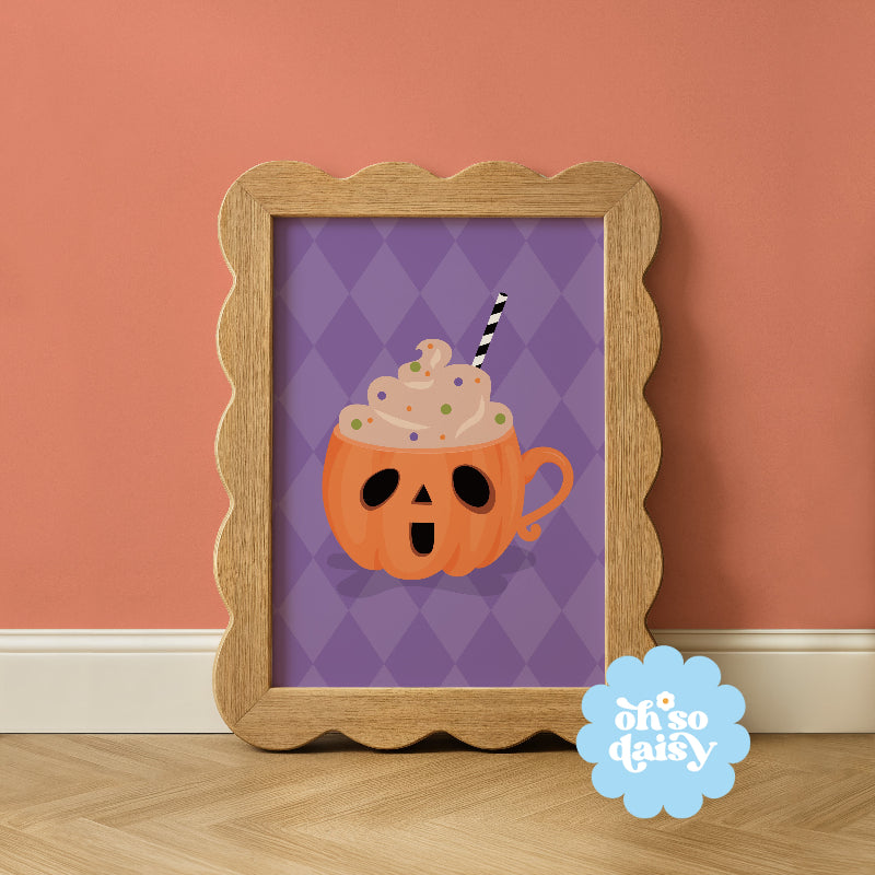 Framed artwork of a Halloween-themed cup with a straw on a purple background, against a peach wall.