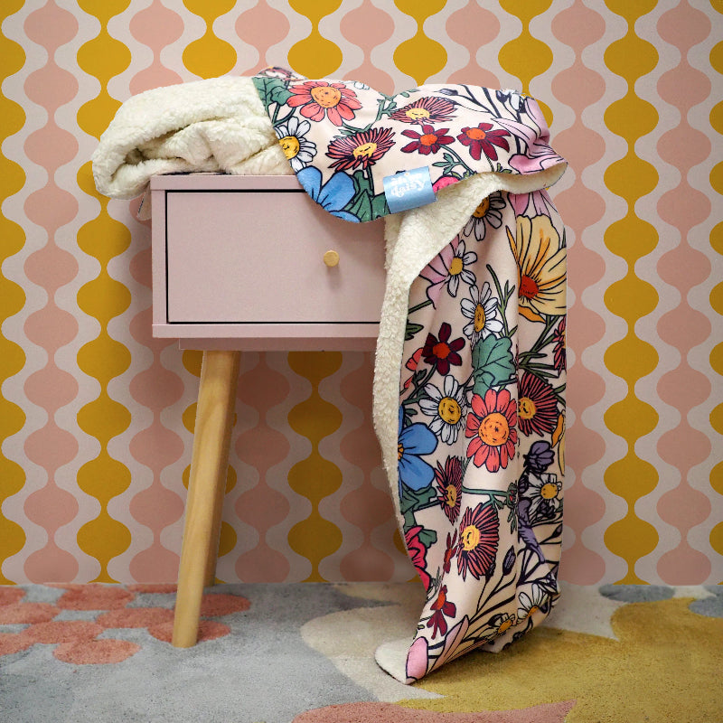 She's A Wildflower by Oh So Daisy in collaboration with Lust Home Sherpa Fleece matching blanket to wallpaper. 