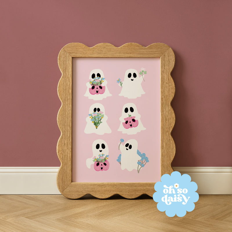 Framed artwork with cartoon ghosts on a pink background, 'oh so daisy' logo visible.