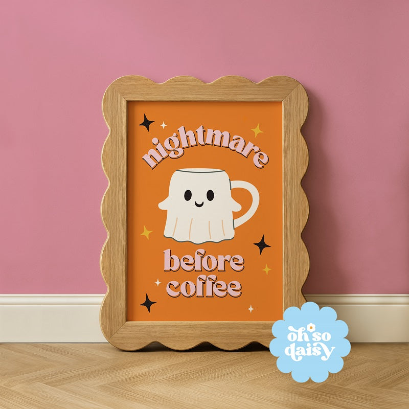 Framed artwork with a ghost mug design and text 'nightmare before coffee' on an orange background.