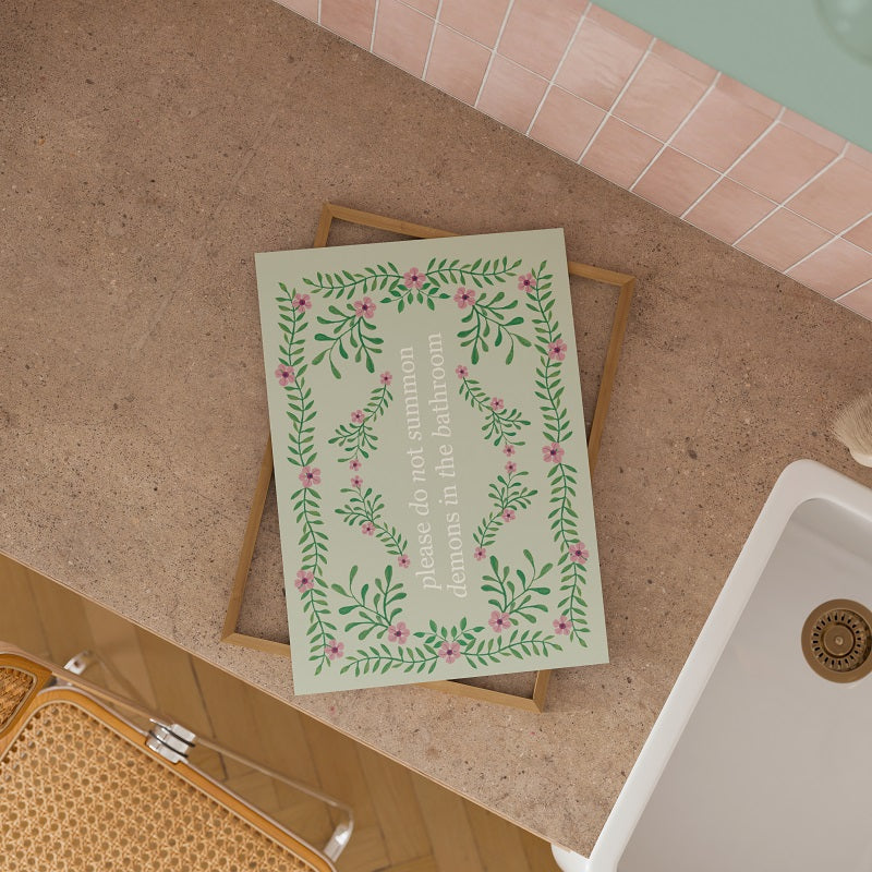 Floral card with text on a wooden surface