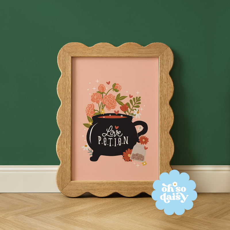 Framed artwork with 'Love Potion' design on a green wall