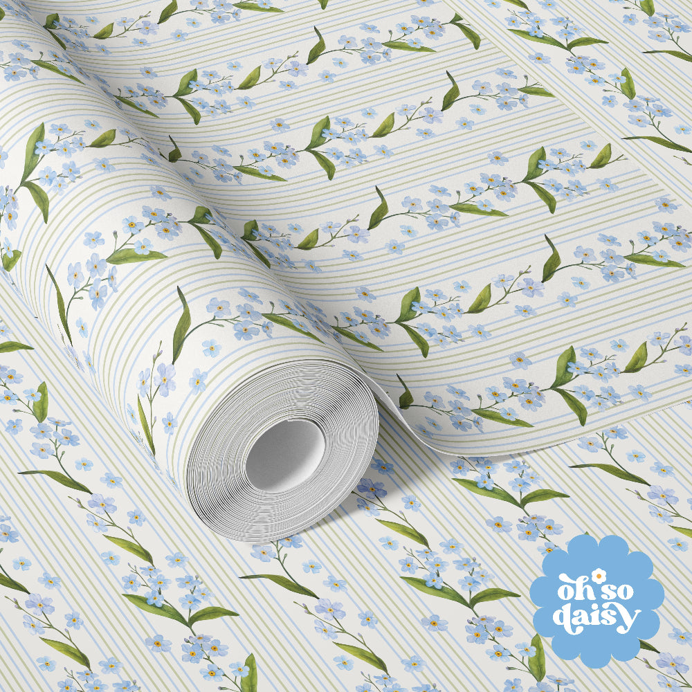 Myosotis Stripe wallpaper pattern with trailing blue forget-me-not florals and fine vertical stripes in a repeating design