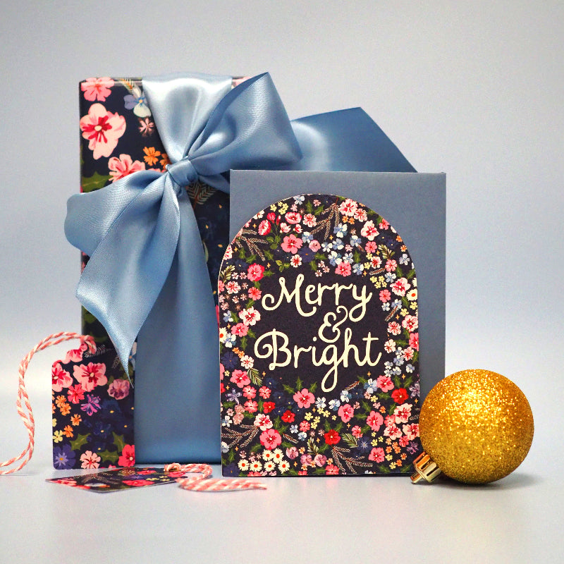 Merry and bright floral christmas card with hollyhock design by Oh So Daisy 