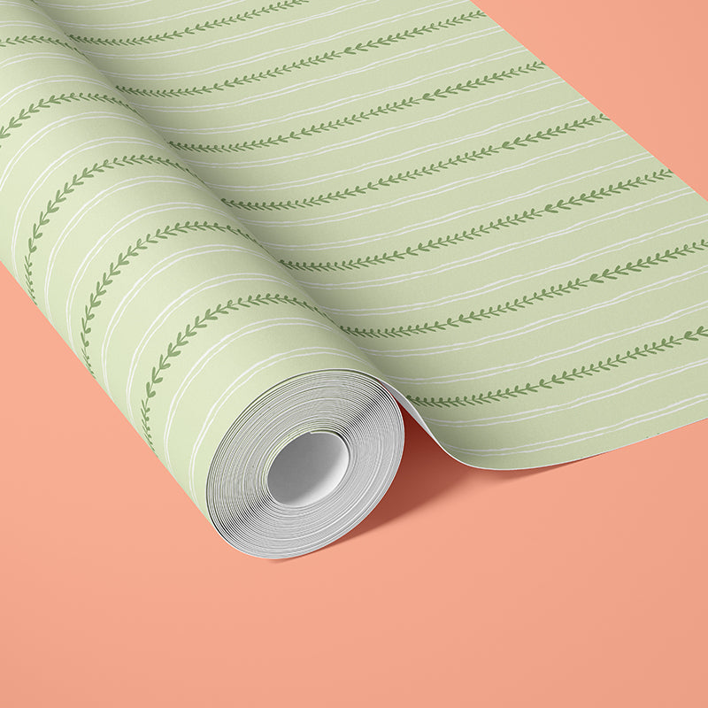 Close-up of Pistachio and Fern green fruit stripe pattern wallpaper o a roll