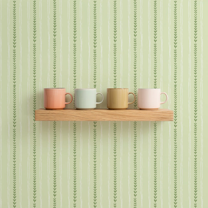 Riviera Stripe Pistachio wallpaper in styled room interior