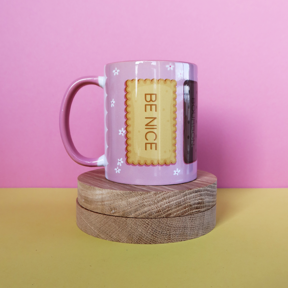 
            
                Load image into Gallery viewer, BE NICE BISCUIT MUG
            
        